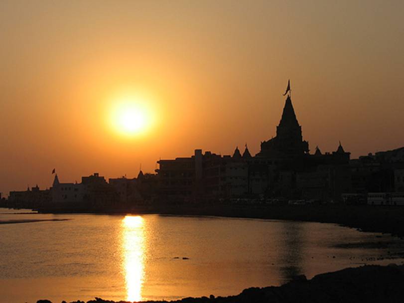 Sunset_by_Gomati_Dwarka_001.jpeg